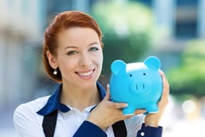 women smiling and holding piggy bank needing MYGA vs CD