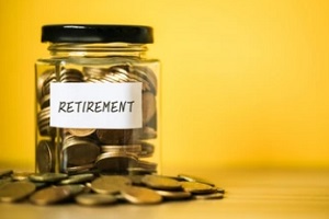 coins in jars with retirement savings