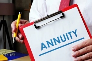 man holding annuity papers in clipboard