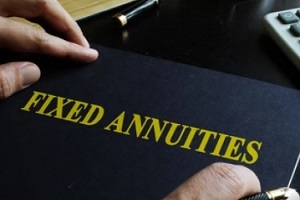 man working on fixed annuity file