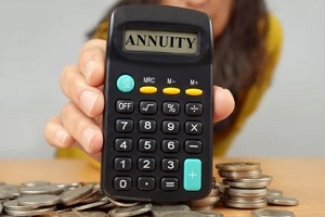 women showing annuity on calculator