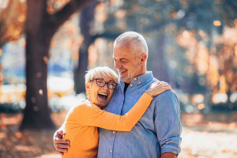 couple laughing outside together