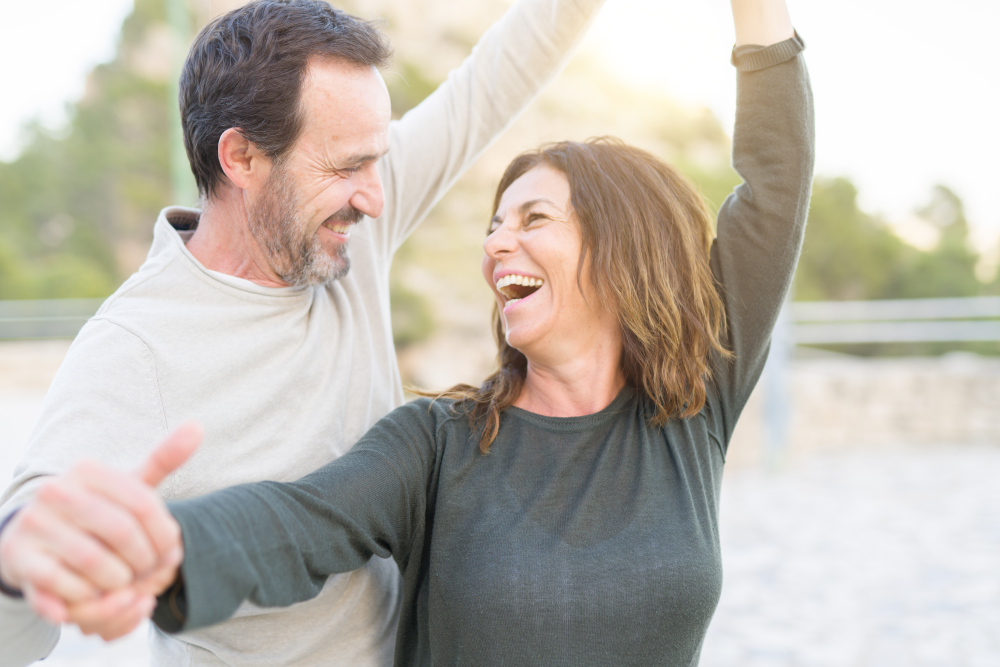 couple outside smiling for a picture