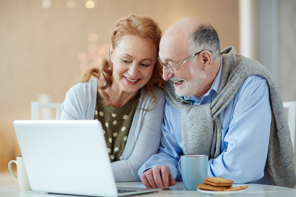 couple searching annuities at home