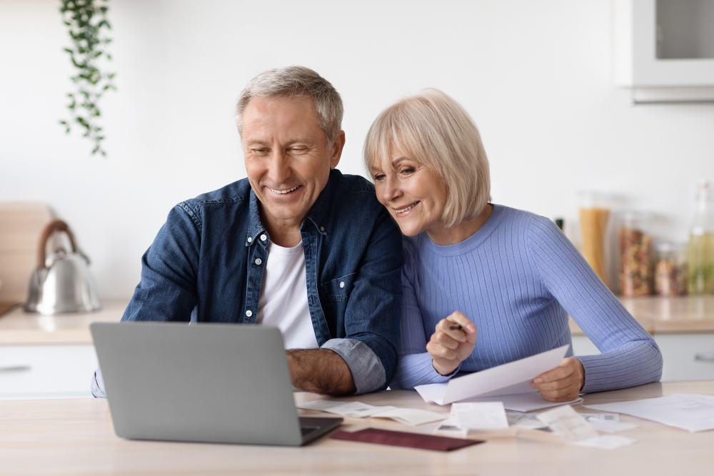 couple searching for annuities at home