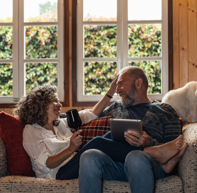 couple relaxing in their home on the couch