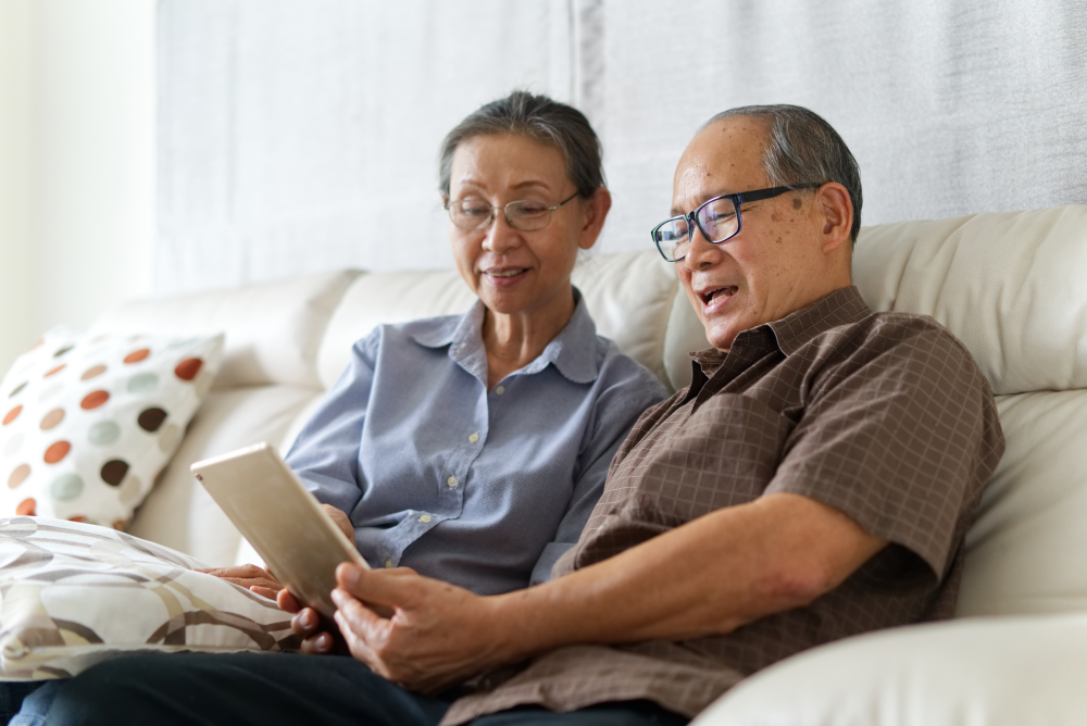 couple on the couch learning about annuities