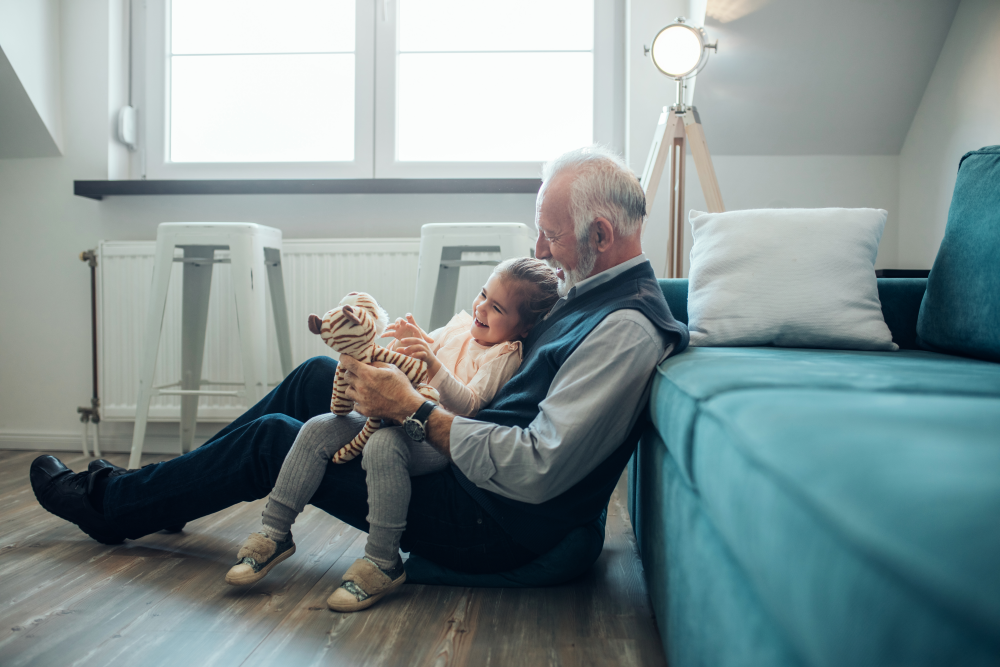 grandpa reading story to his grandchild